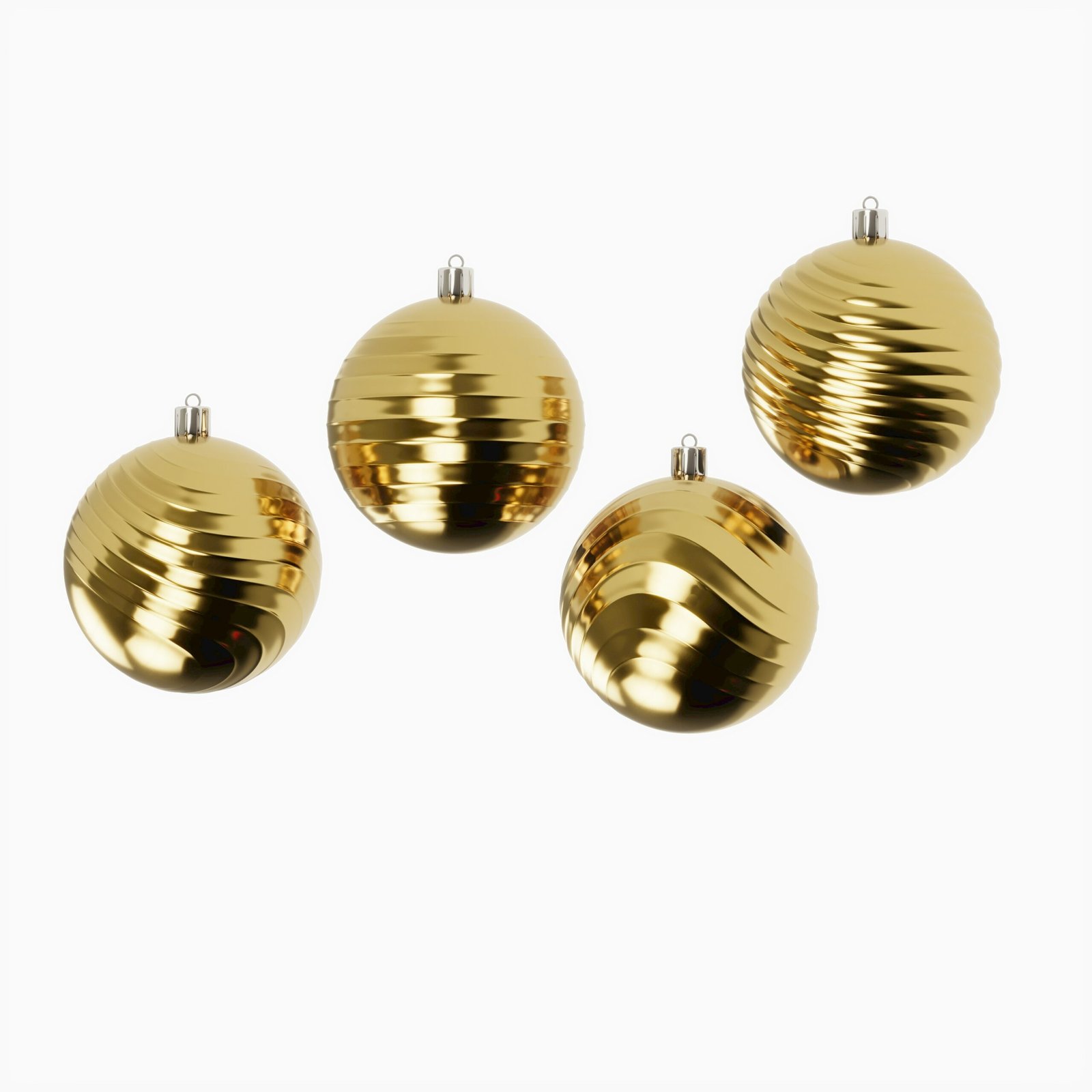 three shiny gold ornaments on a white background